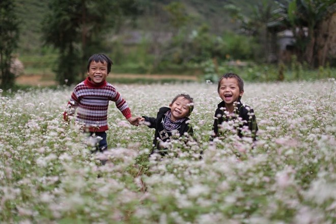 Happy smile of Ethnic peolpe in Buckwheat flower field